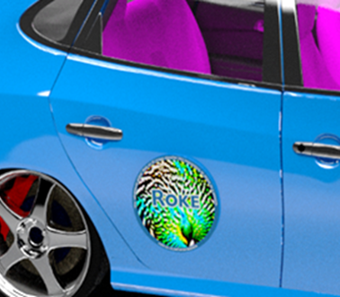 A peacock adversarial patch on the side of a blue car