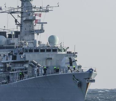 A warship with various communications antennas 