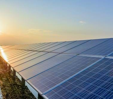 solar panels at sunset