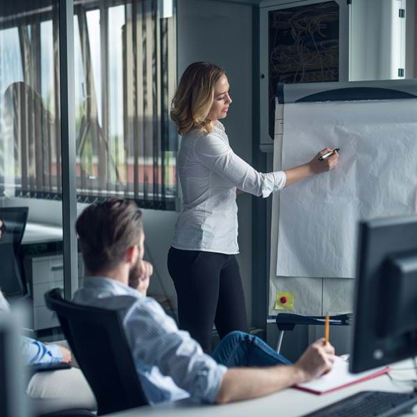 A consultant presents to her colleagues