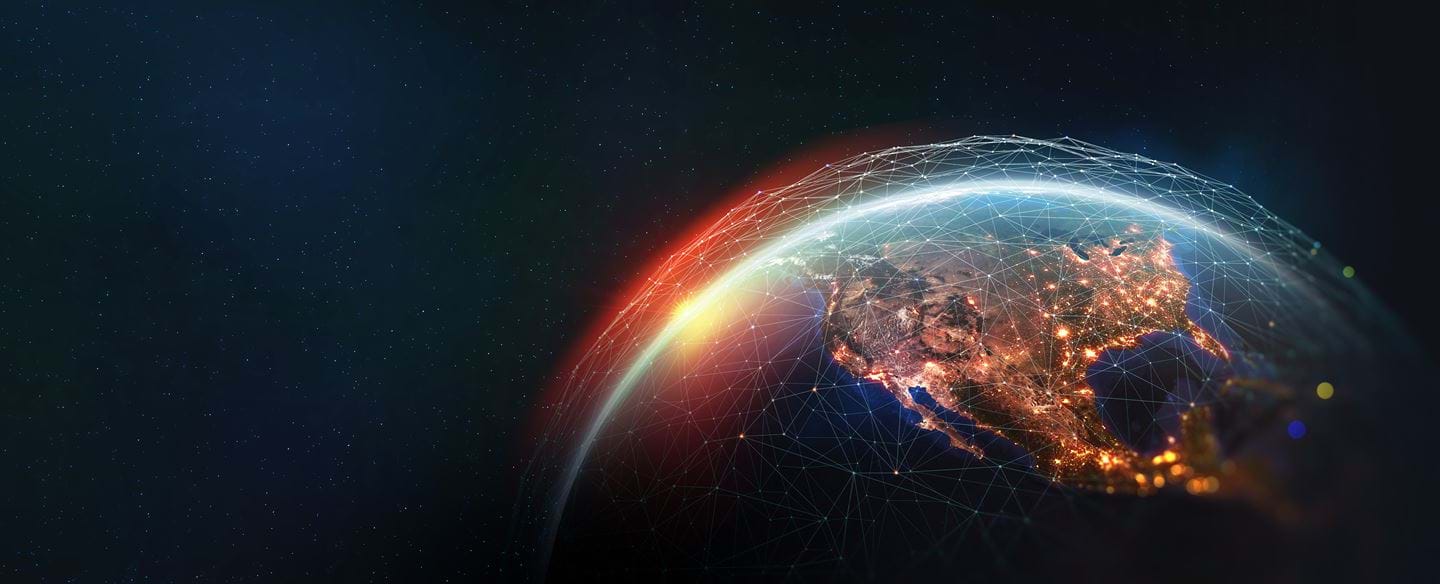 The illuminated world globe showing the maritime domain awareness platform, Geollect. 