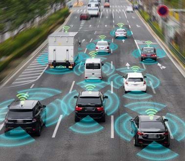 a graphic of cars using automated sensors on a highway
