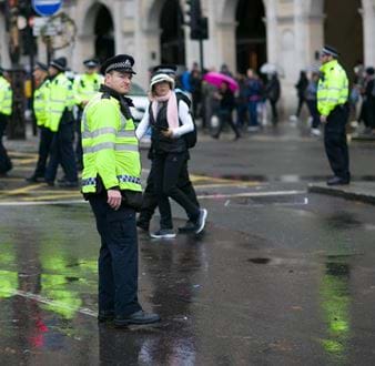 A police officer in high vis doing traffic directions